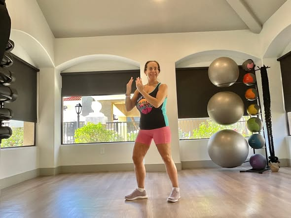Linda in 2026 in a bright fitness studio, strong and lean